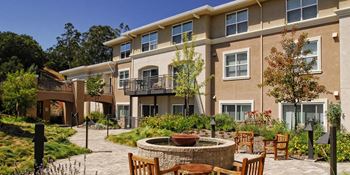 Courtyard gardens featuring fountains and seating areas